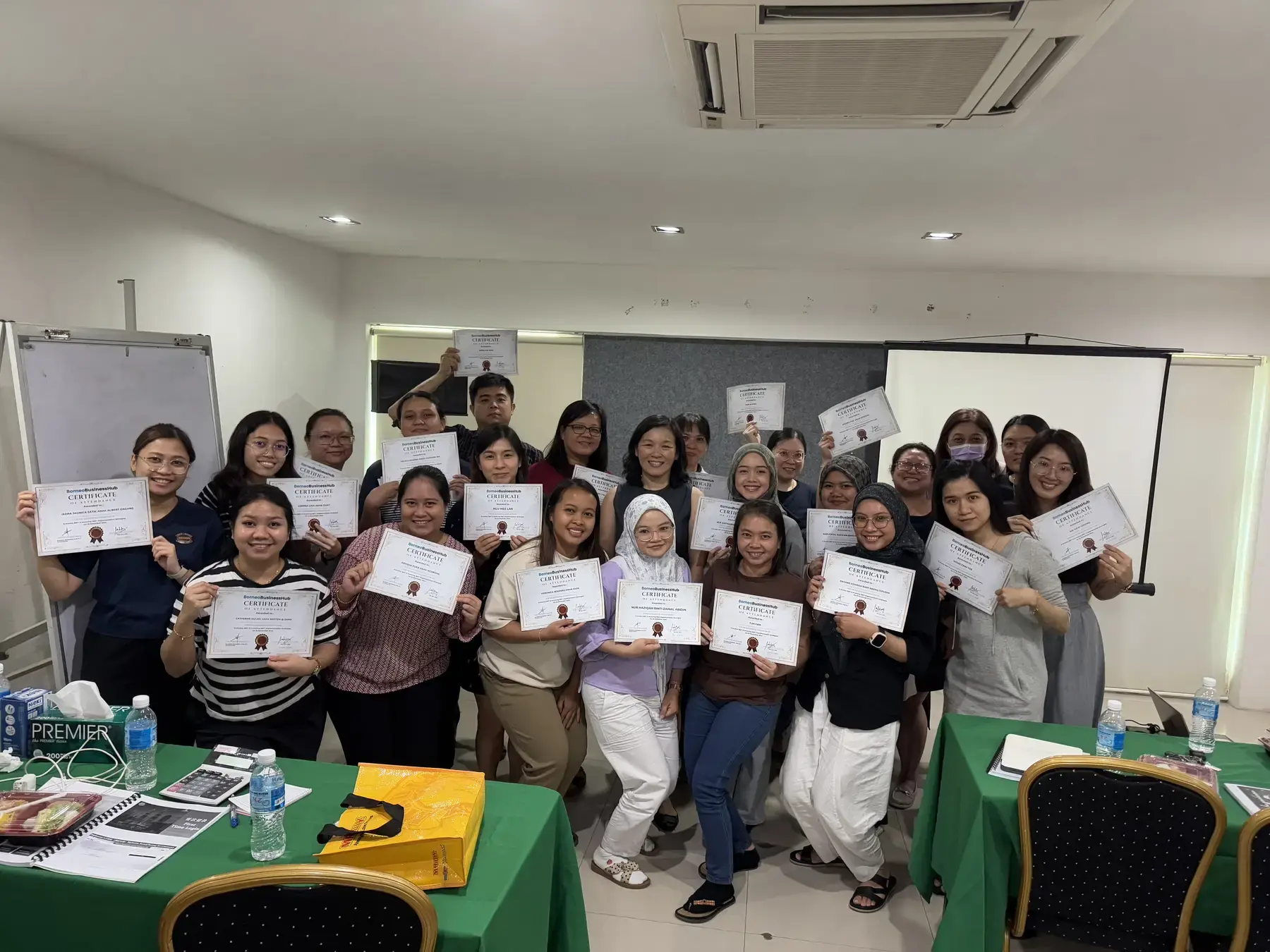 Participants holding certificates of attendance